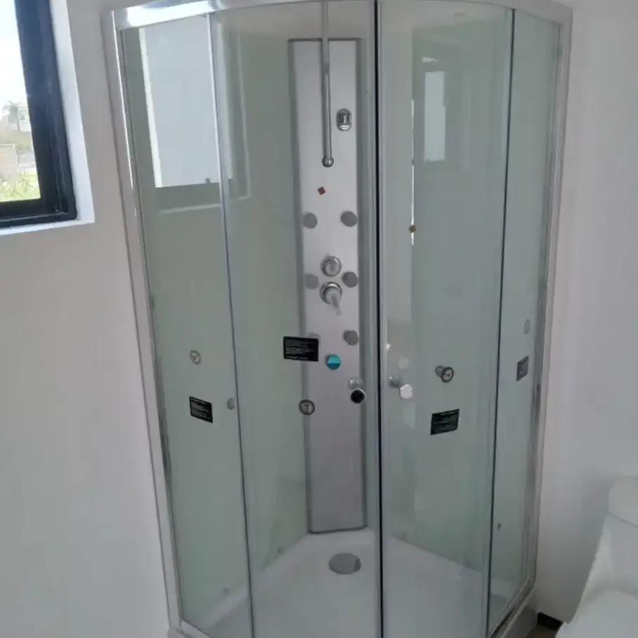 Cabina de ducha circular con puerta de cristal's photo #1